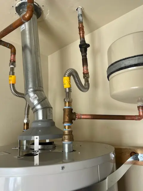 Water heater installation and plumbing repair in Manchester